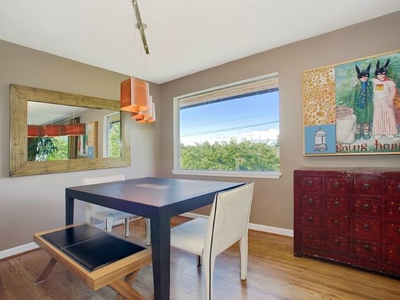 Dining area has view & opens to living area. Great for entertaining.