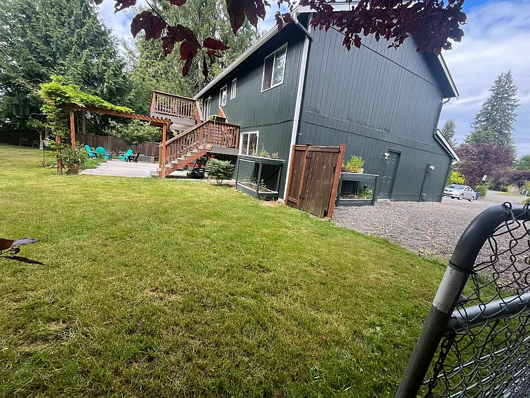 wide gate opens to driveway