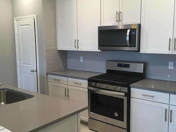 Another view of kitchen. Door to the left is the pantry.