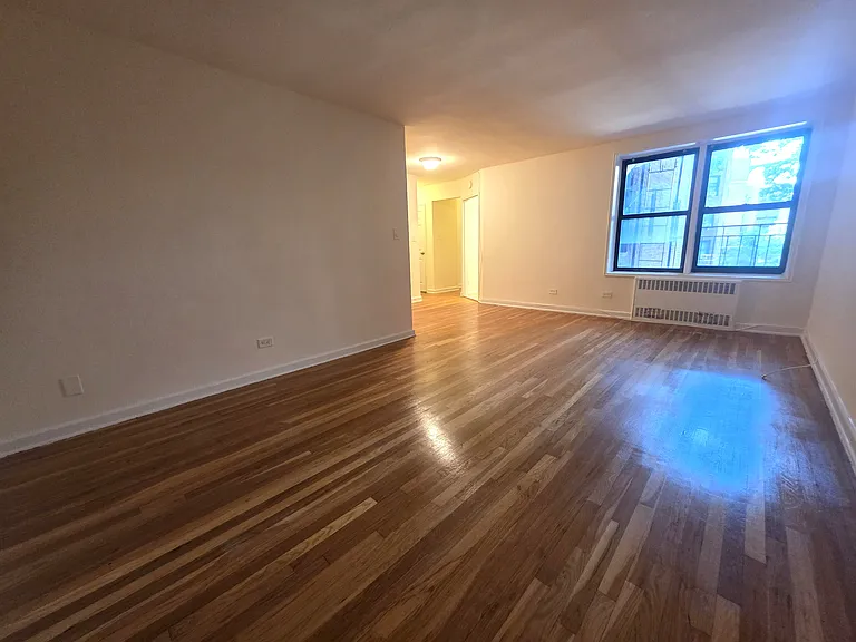 90-11 35th Ave #2H — Photo 1