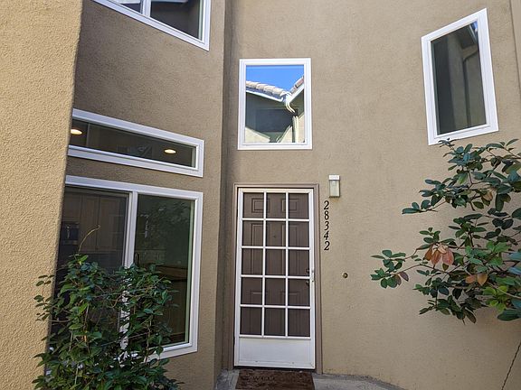 Front door, kitchen window, upstairs guest bedroom window, stairway windows