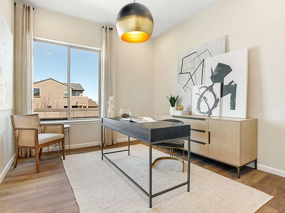 Den off the entryway can be used as a home office, craft room, and more.