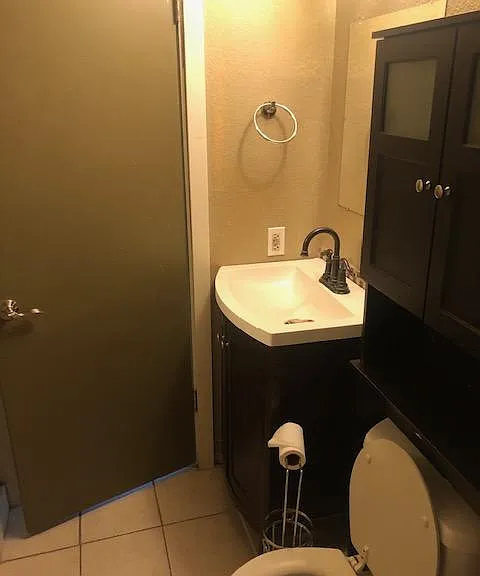 another look at the bathroom with shower in the middle floor