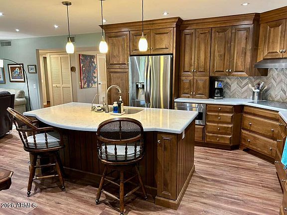 3rd image of 10009 W Pleasant Valley Rd