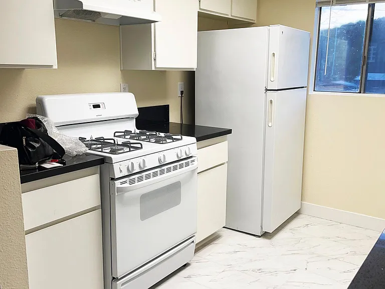 Kitchen with gas stove and lots of cabinets