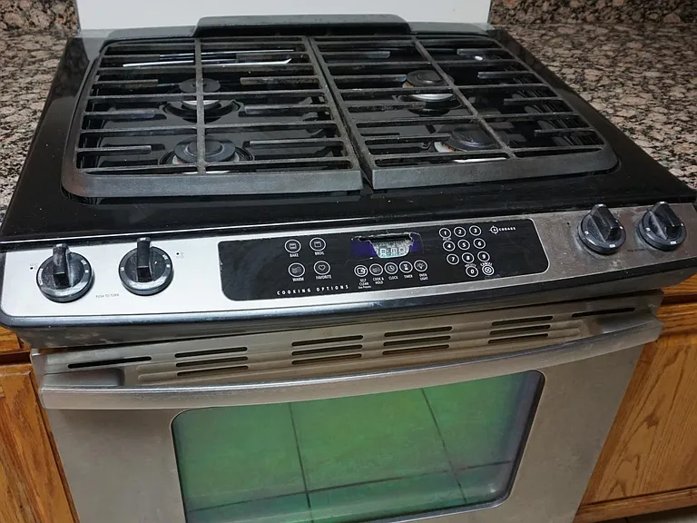 Stainless steel stove with cooktop
