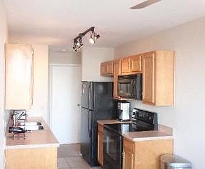 4th image of 6010 Oakwood Dr APT 4M