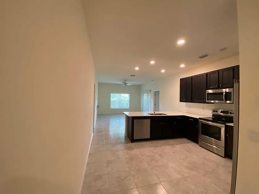 View of open concept kitchen/living area - 138 Jade St