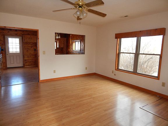 After stepping through the sun porch you have a nice large family room.