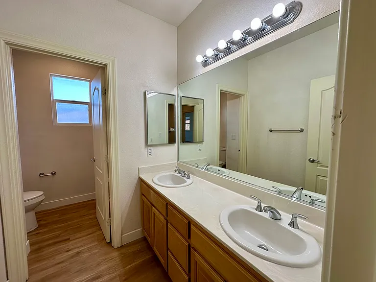Upstairs:
Hall Bathroom with double sinks