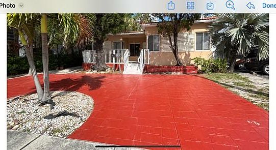 FRONT OF PROPERTY INCLUDING PRIVATE CIRCULAR DRIVEWAY WITH VERY NICE LANDSCAPE AND SUPER LG PORCH FOR YOU TO ENJOY