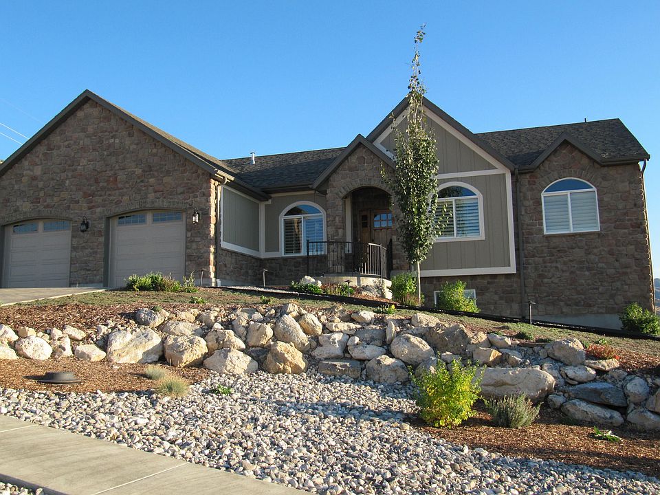 This is your stunning custom dream home! High on North Logan's bench!