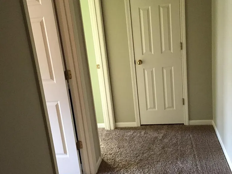 End of hallway to the right after leaving M. bedroom