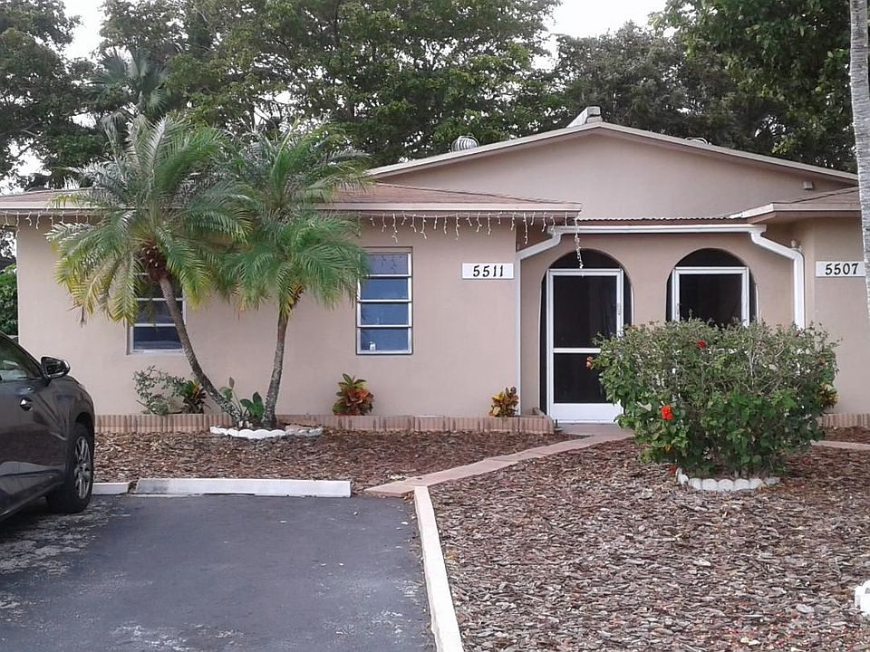 Front of the home with private 4 car parking spaces.