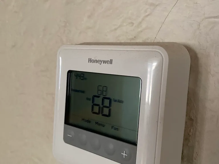 Oil heat thermostat