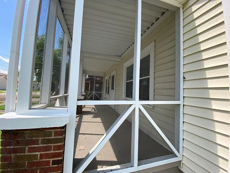 Handcrafted, very large screened in porch.