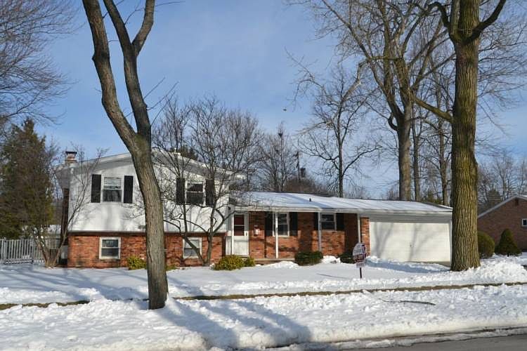Move right into this 3 bedroom home.  You will love the many updated windows and hardwood floors.  The home has a great flow with all of the bedrooms being on the second level.  The balance of the floor plan is open.  The kitchen & baths were recently updated and feature Maple cabinets with appliances.  The backyard is fenced and has many mature trees for added privacy. The sun room is a great added bonus! Close to Adams elementary.  Call today for your personal showing.