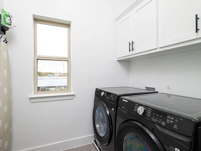 Washer, dryer, iron, and ironing board available for use!