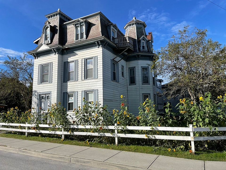 It's a historic house that was moved across town. Your apartment is on the third floor. Your living room is in the tower you see on the right. Your master bedroom is on the corner of the house.