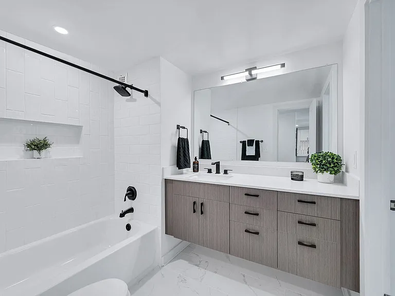 Spa inspired bathrooms with tiled shower and custom vanity