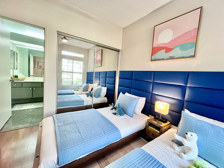 Twin beds or king bed, private attached bathroom, full-length mirrored closet, perfect for kids or additional guests.