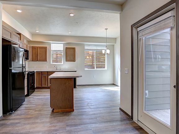 Spacious kitchen with island that you can sit and eat at plus dining nook