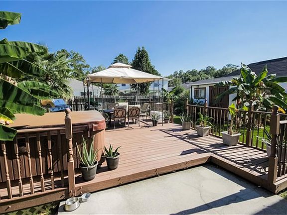 Entertainers Dream Backyard with Decking, Hot tub, BBQ that Stays & Lush Landscaping for Privacy