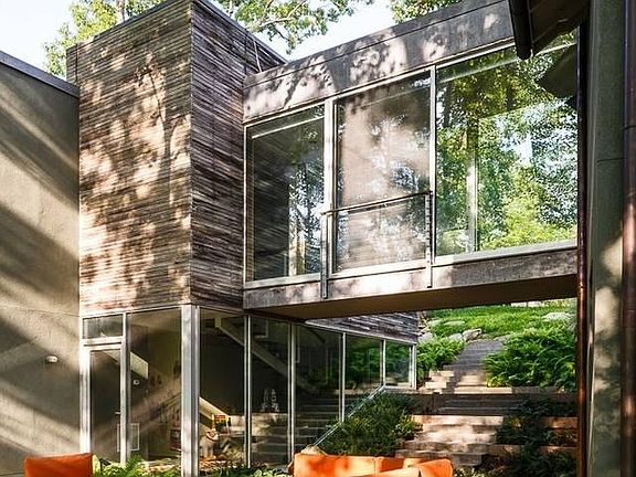 bridge and stairwell separating wings of the home