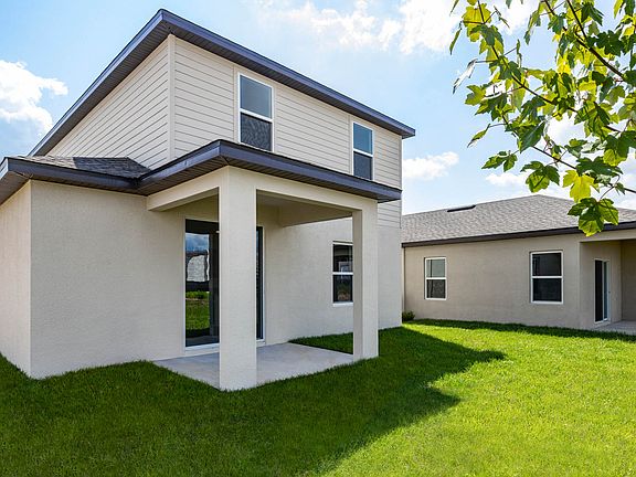 Entertainment space awaits on the covered back patio