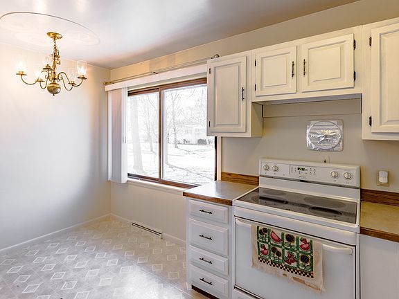 Kitchen has room for round table and chairs