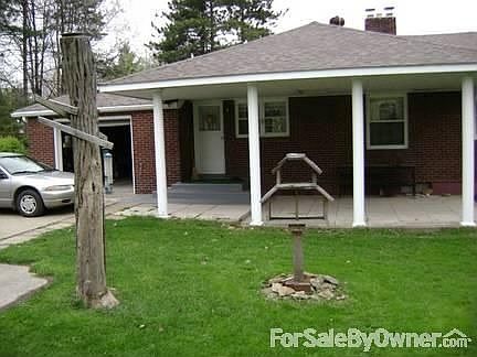 back patio : shows the attached garage