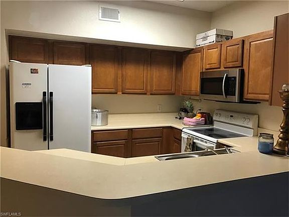 5th image of 15585 Ocean Walk Cir APT 213