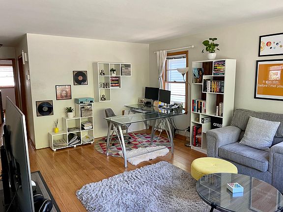Large living room with hardwood floors.
