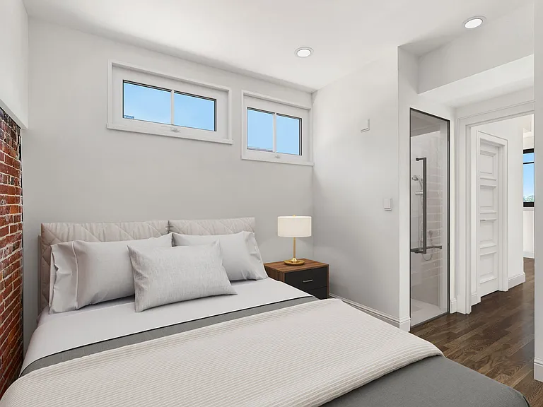 Upper Penthouse loft bedroom ( Upper floor) with view of Famous Historic Congress st north Church Steeple; and full bathroom