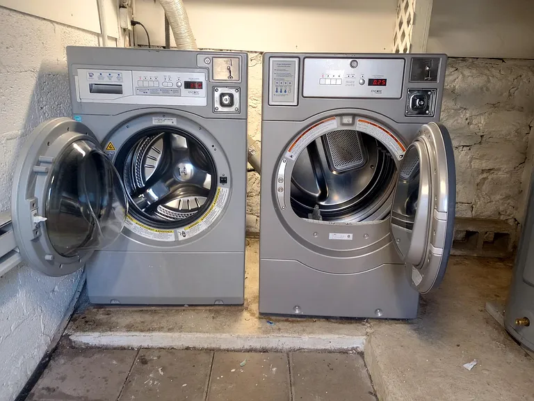 Coin laundry in basement