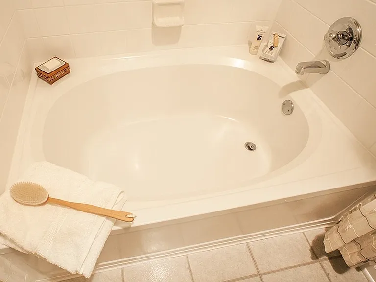 Savor moments of peace and quiet in our modern apartment bathroom