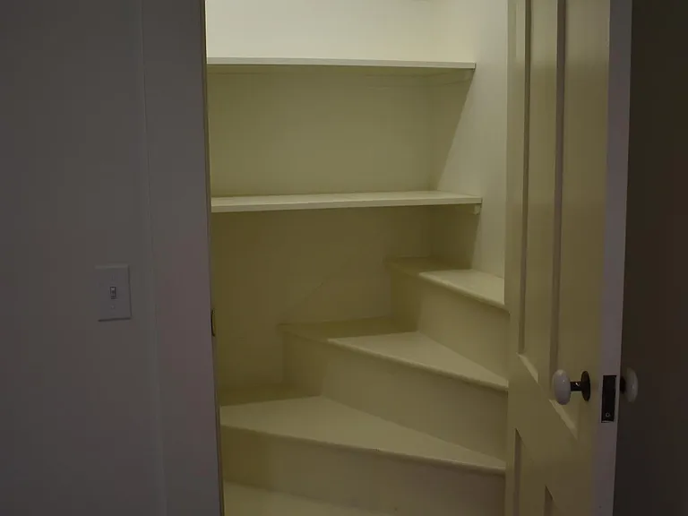 Unit 1 Kitchen Pantry (formally stairs to 2nd floor, now closed off and repurposed for your use)