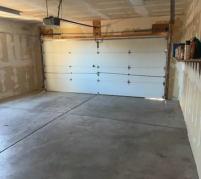 2 car garage with extra 3 ft storage at front of garage.