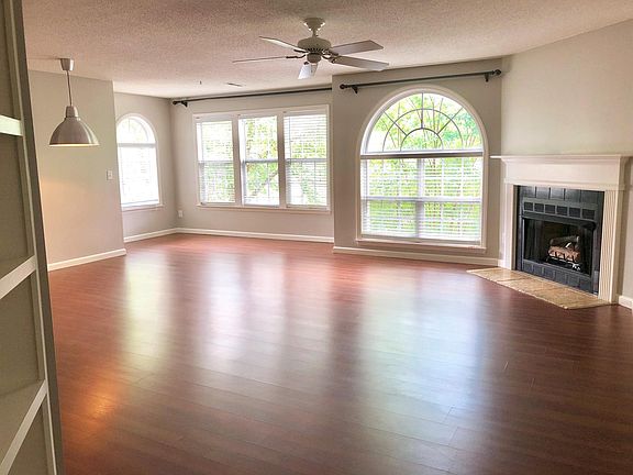 View from Entryway into Great Room Featuring Gas Fireplace 