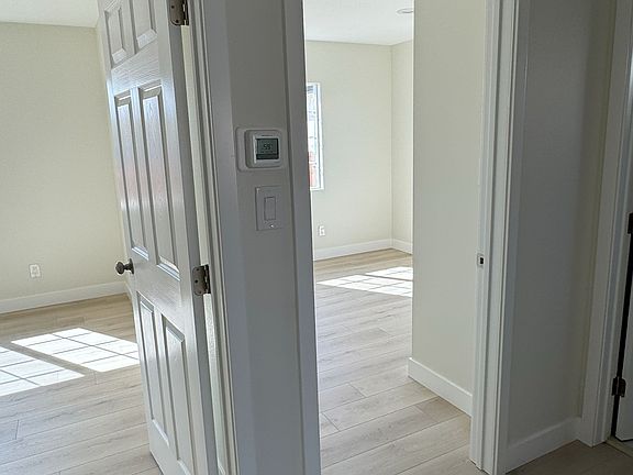 Spacious and bright Bedrooms with shelved closet.