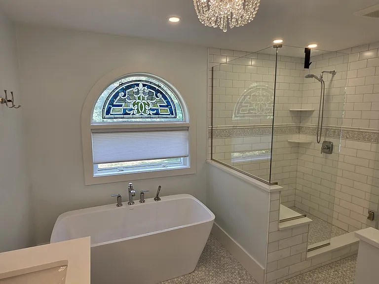 Primary bathroom, roman tub and walk-in shower.