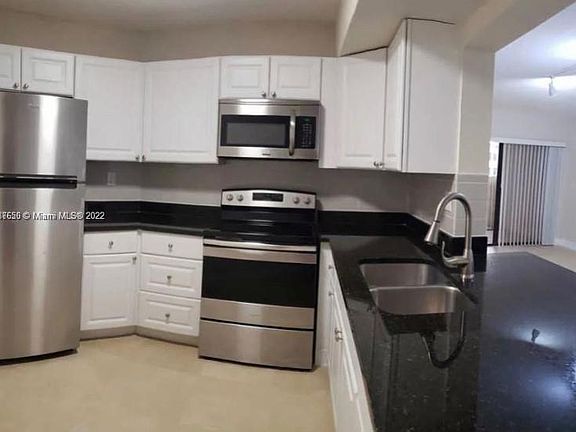2nd image of 9419 Fontainebleau Blvd #112-IV