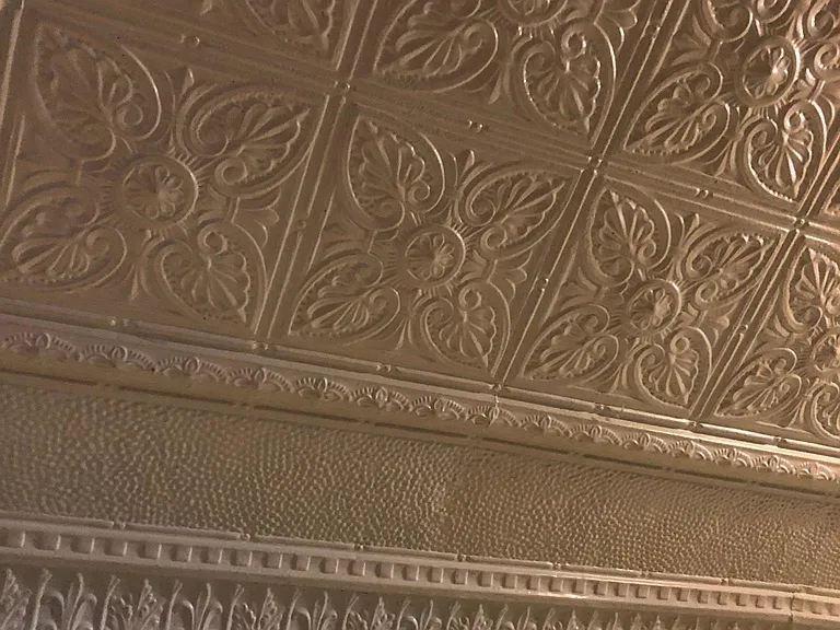Tin ceilings in many rooms