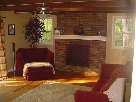 Great Room with gas fireplace and Hardwood Floors