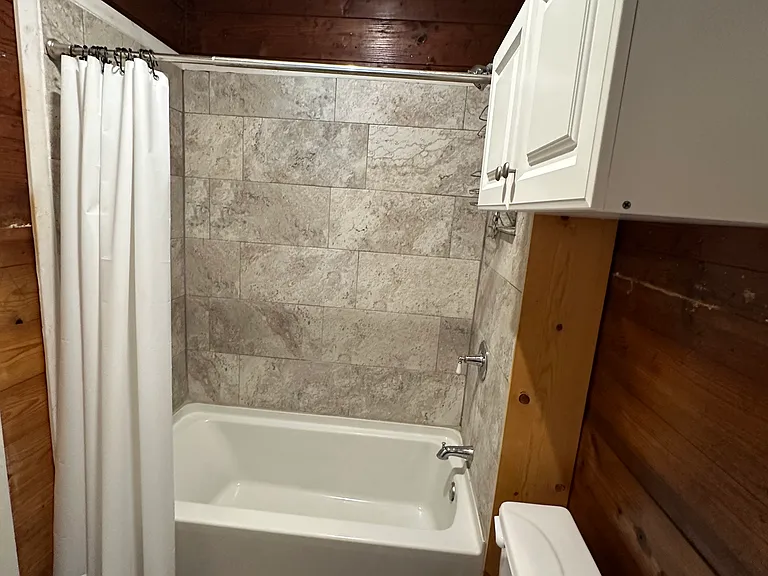 Bathroom with tub / shower option.