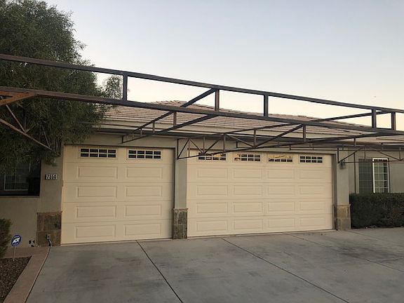 3 Car Garage- the awning is in process of being removed.