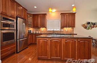 Elegant cherry wood cabinetry
