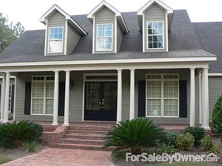 Exterior 3 : Brick porch and double glass paned doors