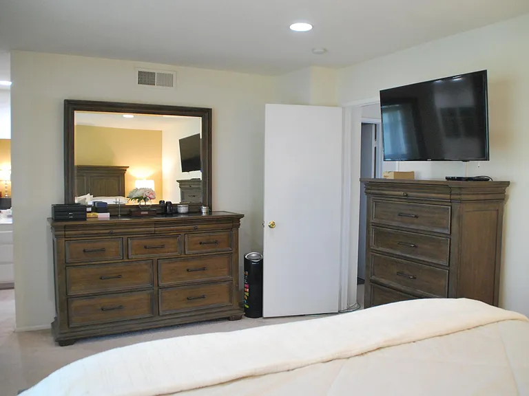 Spacious master bedroom fits Cal King bed
