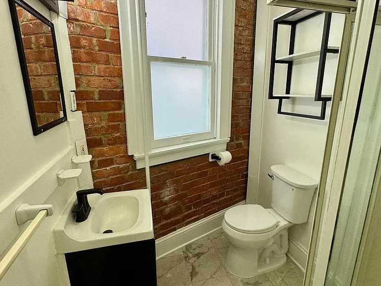 112 E 3rd St — Photo 9